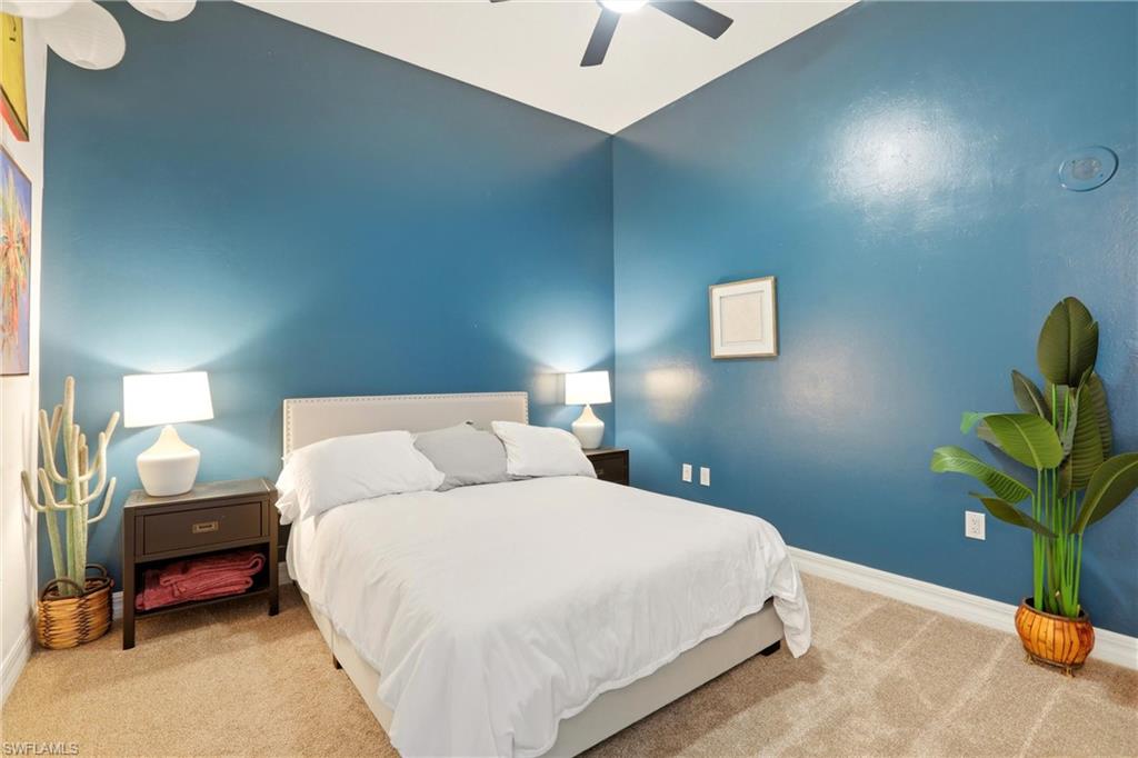 Bedroom featuring carpet flooring and ceiling fan