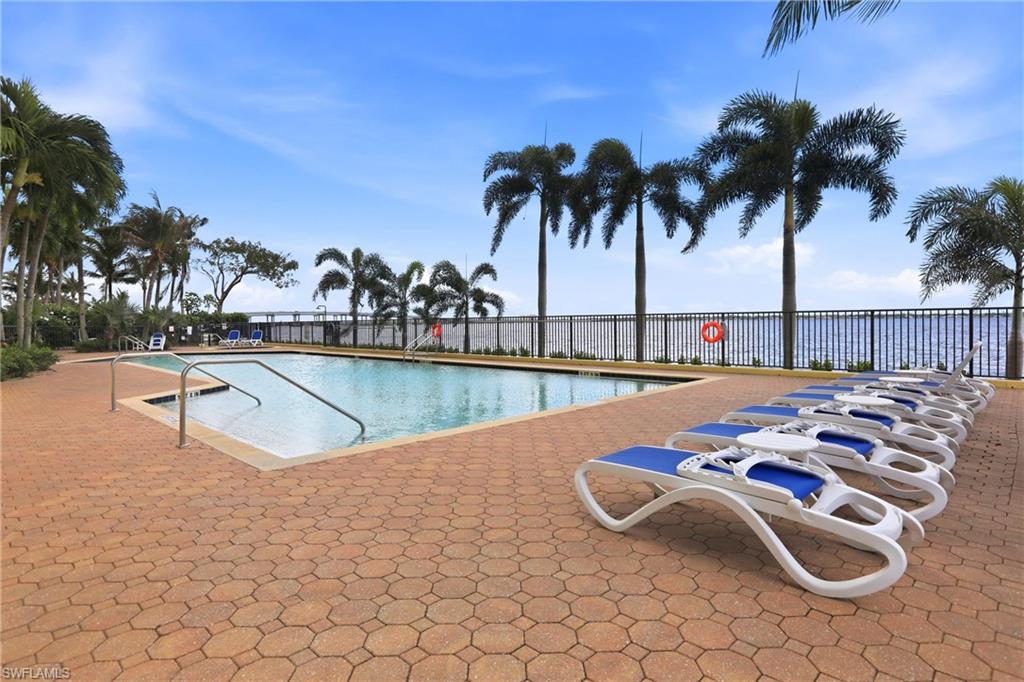 Community pool featuring a patio area