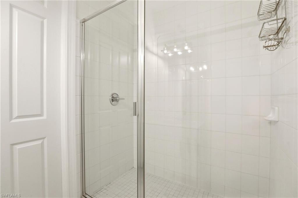 Full bath with a shower stall