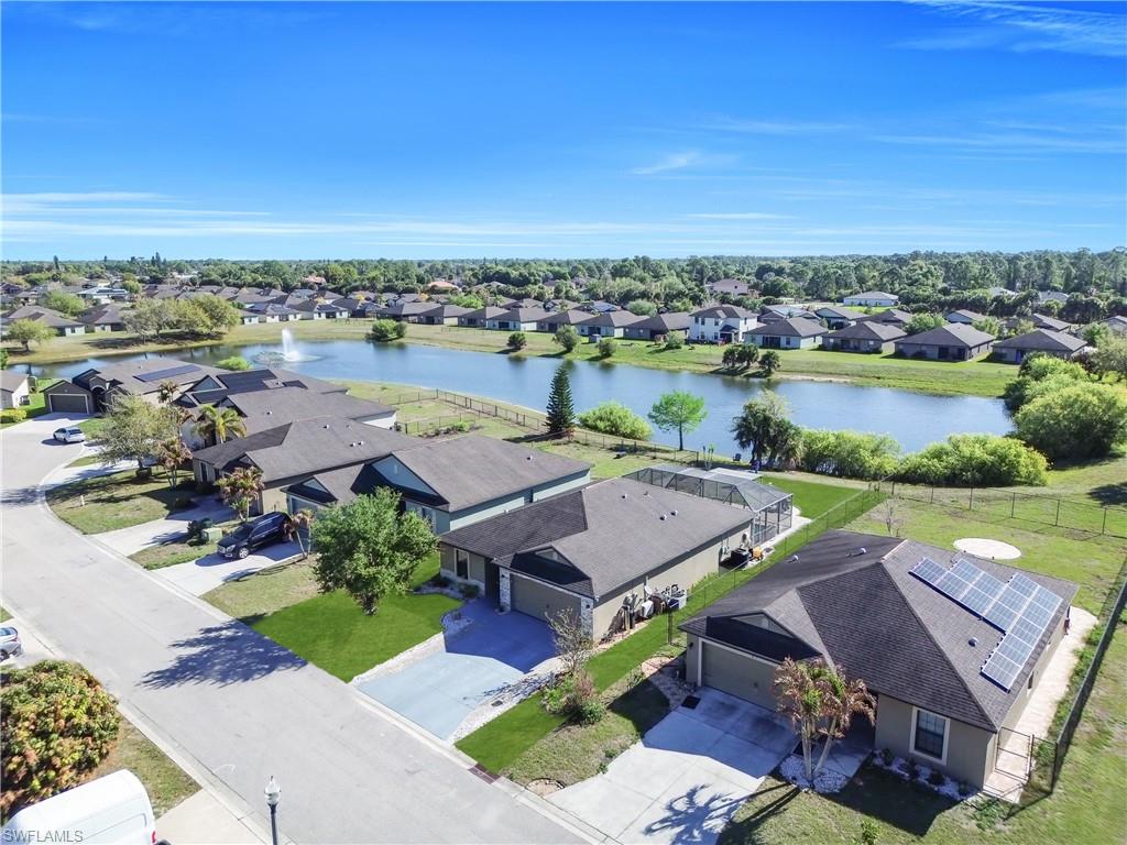 Aerial view of residential area with a nearby body of water