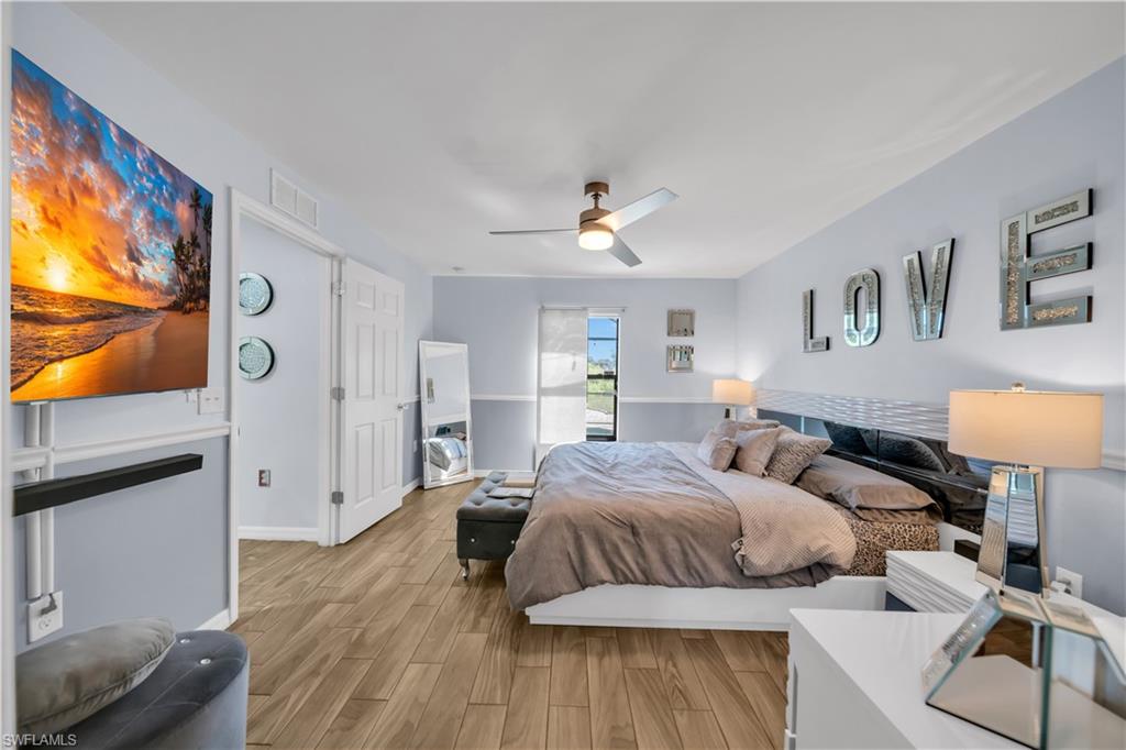 Bedroom featuring light wood-style floors and ceiling fan