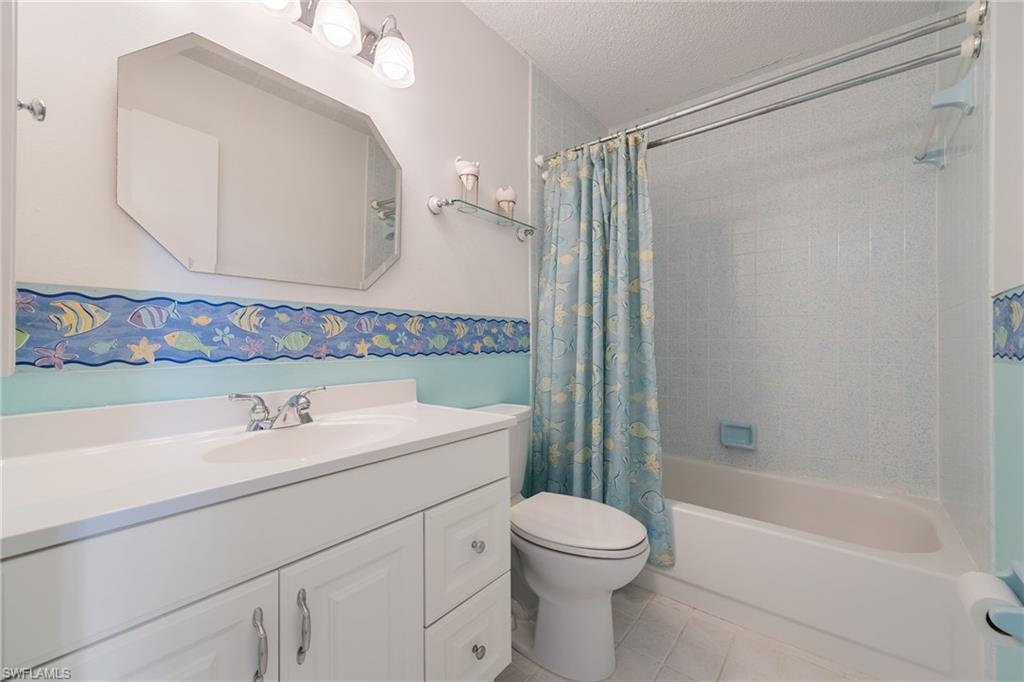Guest bathroom with tub/shower conbo