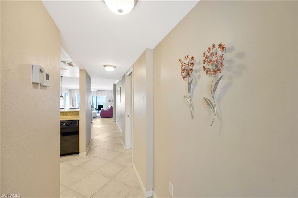 Corridor with light tile floors