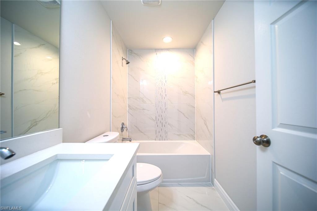 The Master Bathroom Has Granite Countertops And Custom Accent Tile Over The Tub Area!