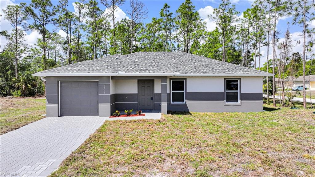 Amazing New Construction! This Brand New 3 Bedroom/2 Bathroom Home On An Oversized .29 Acre Lot With Old Growth Trees In The Greenbriar Neighborhood In Lehigh Acres!