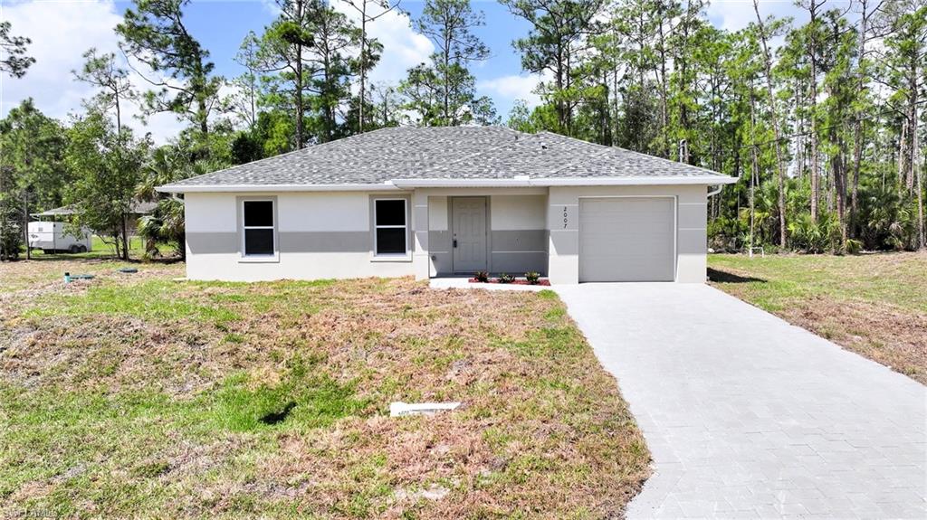 Amazing New Construction! This Brand New 3 Bedroom/2 Bathroom Home On An Oversized .32 Acre Lot With Old Growth Trees In The Greenbriar Neighborhood In Lehigh Acres!