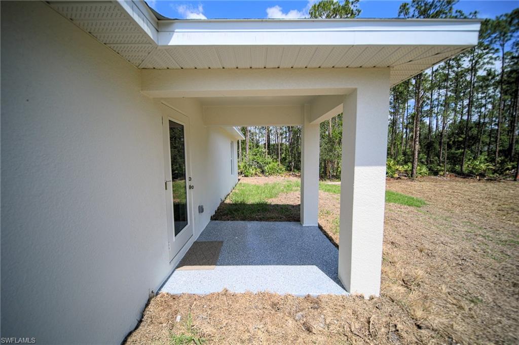 Side View Of Covered Lanai With Epoxy Coating!