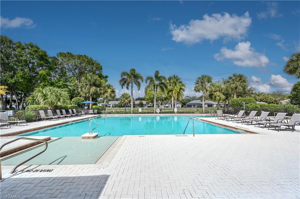 Community pool featuring a patio area