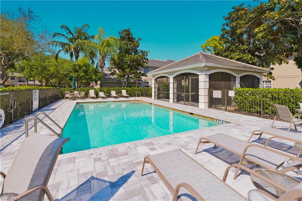 Community pool featuring a patio area