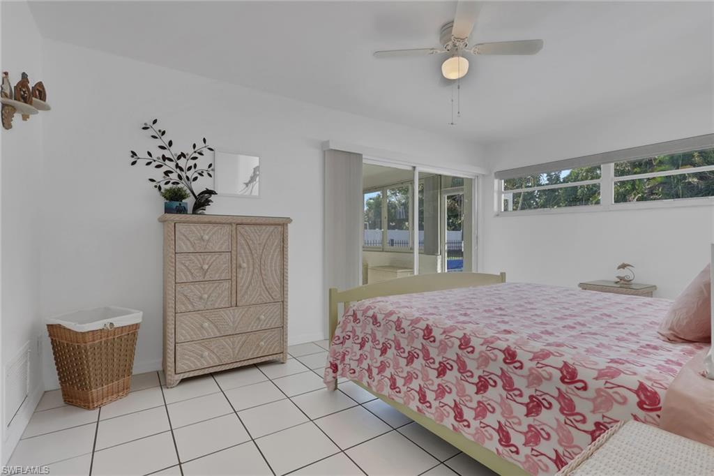 Primary Bedroom w/Sliders to Sun Room