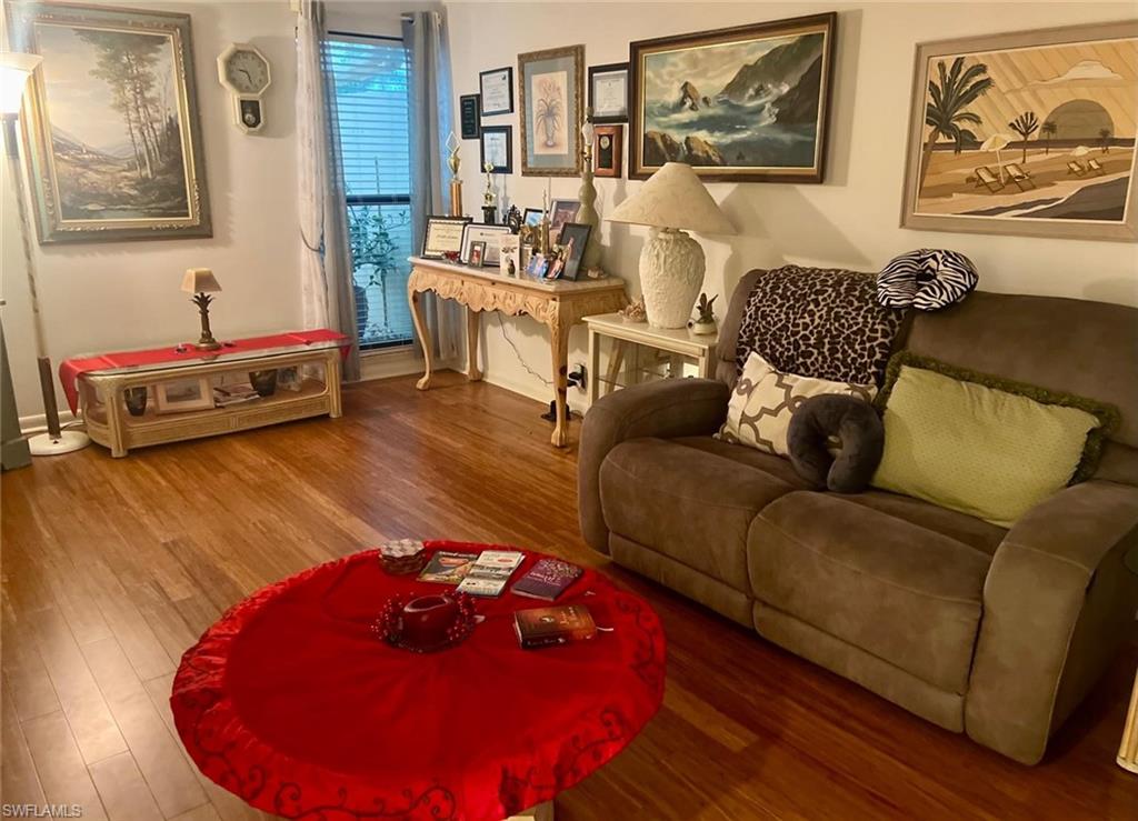Living area featuring wood finished flooring