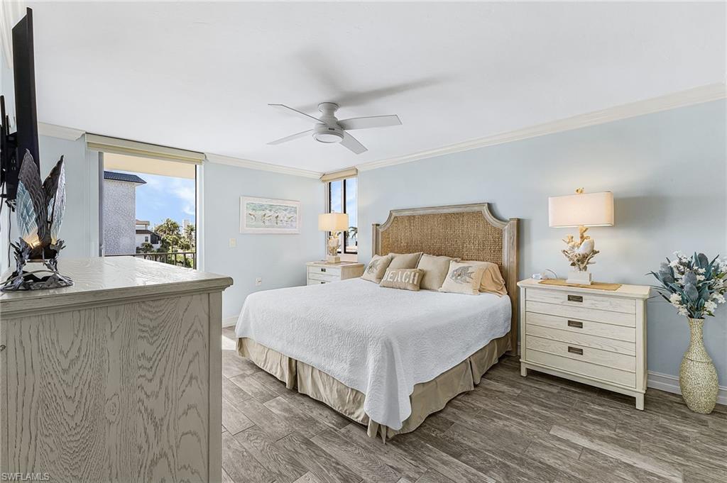 The primary bedroom has a private balcony with a Gulf view.