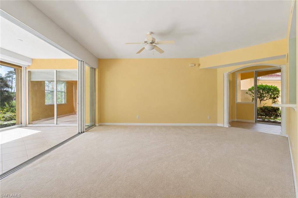 Large living room with sliders to lanai