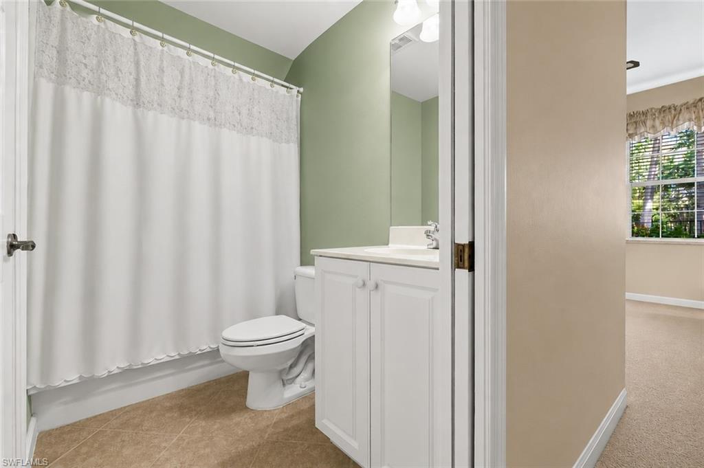 2nd bathroom with pocket door, open to 2nd bedroom and hallway