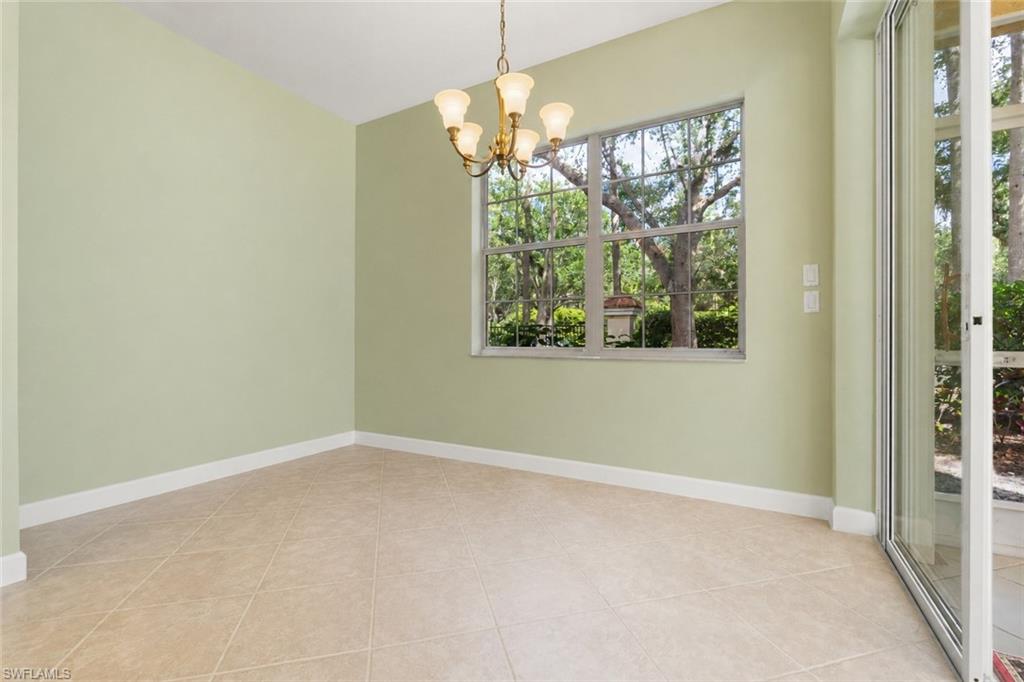 Casual dining area in Kitchen, with access to lanai