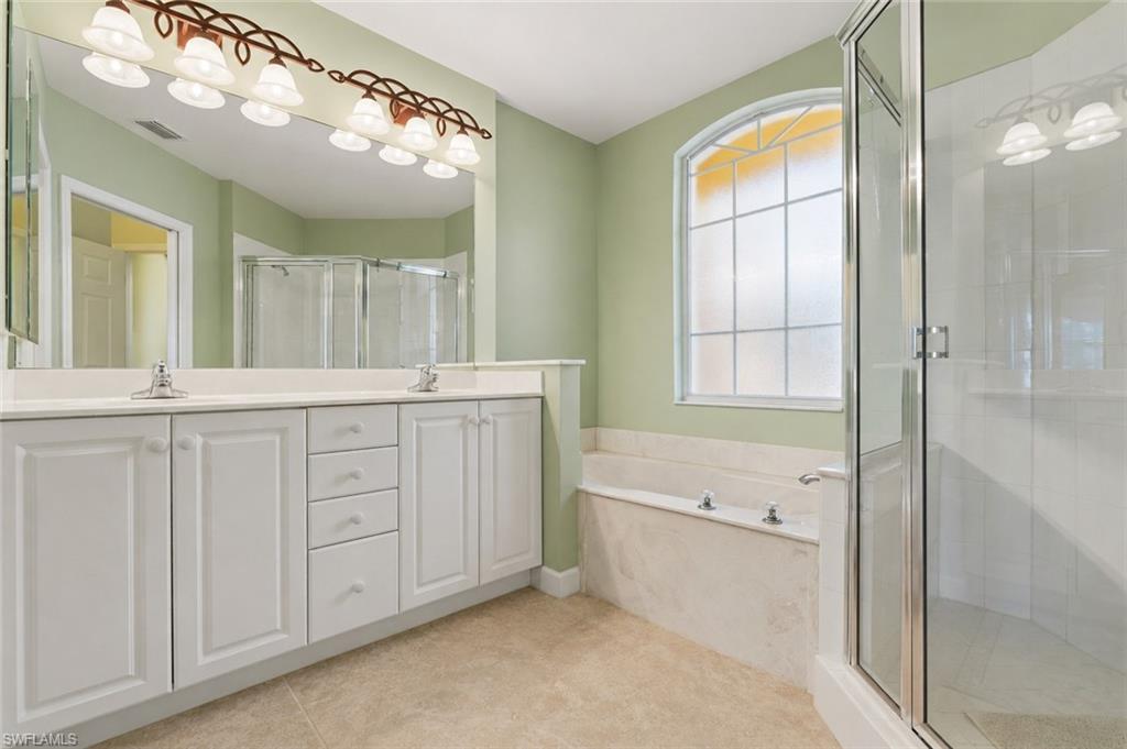 Master bathroom with soaking tub and shower.