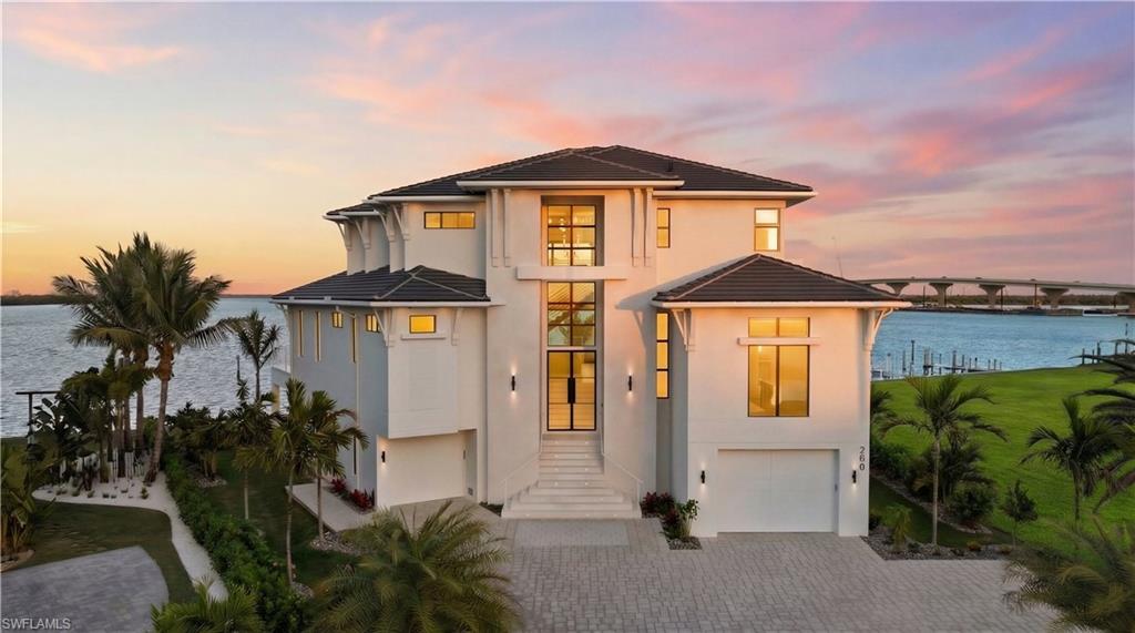 EXCEPTIONAL NEW CONSTRUCTION COMPLETED MARCH 2026 — COASTAL LUXURY, PERFECTED! Virtually edited image