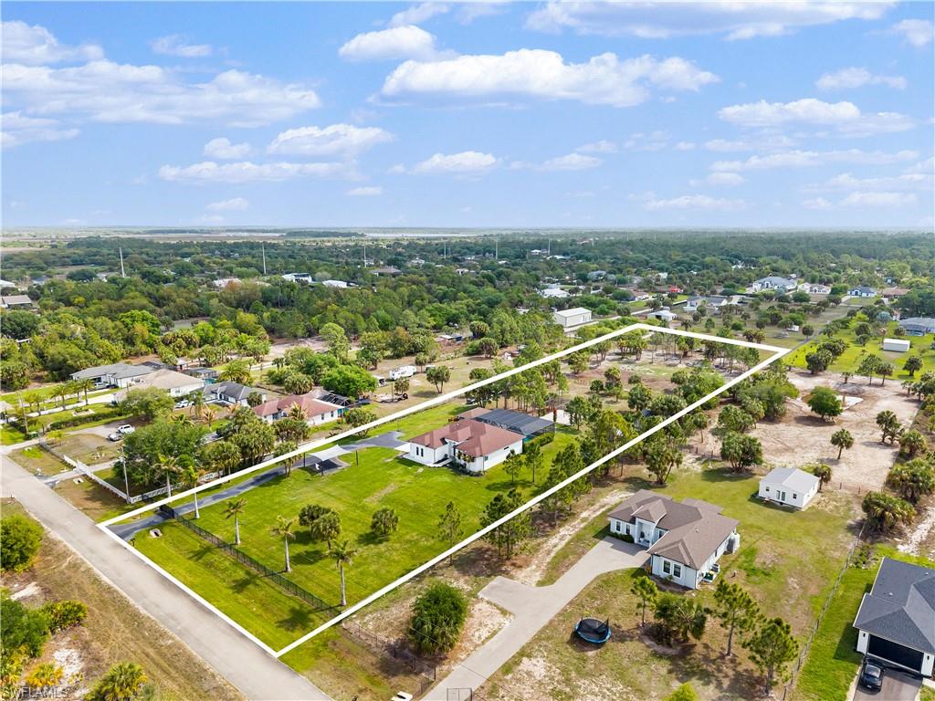 Aerial perspective of suburban area with property boundaries highlighted