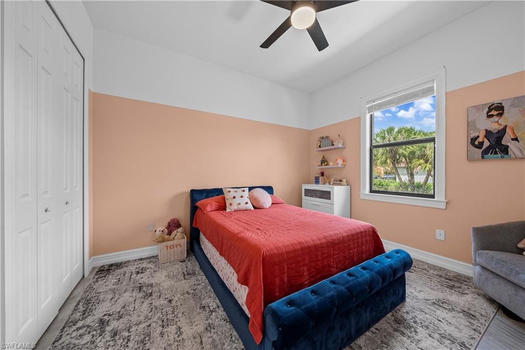 Bedroom featuring a closet and a ceiling fan