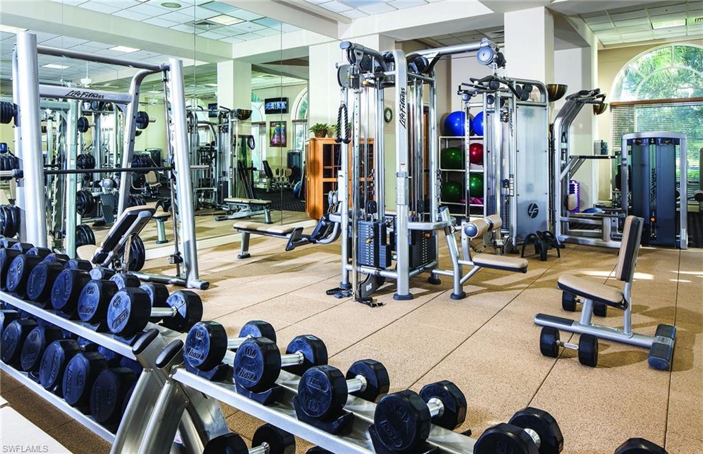 Exercise room featuring a drop ceiling