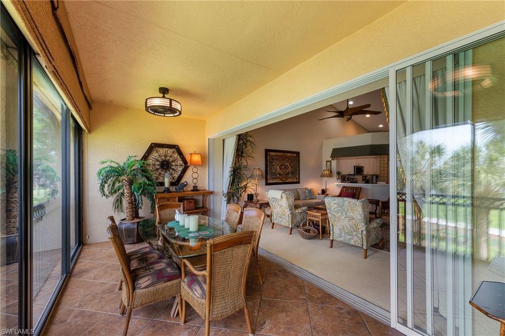 Dining area with ceiling fan and a textured ceiling
