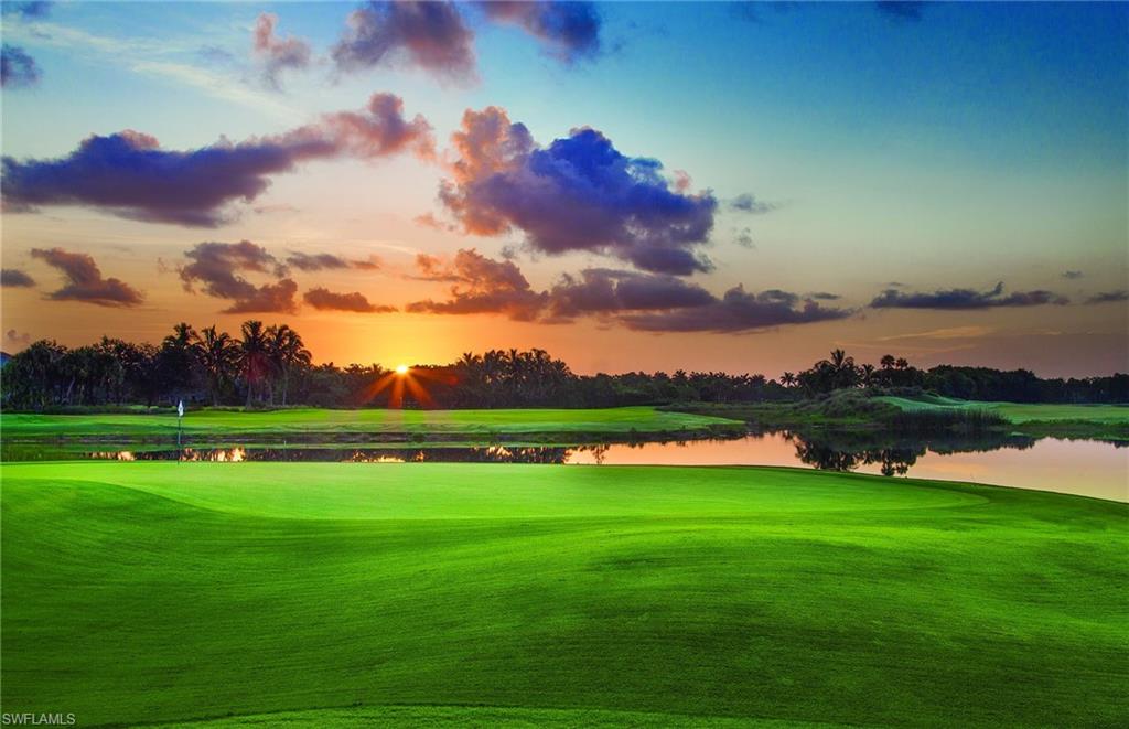 Surrounding community featuring a water view and view of golf course