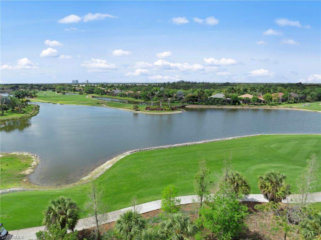 Aerial view of a golf course and a large body of water