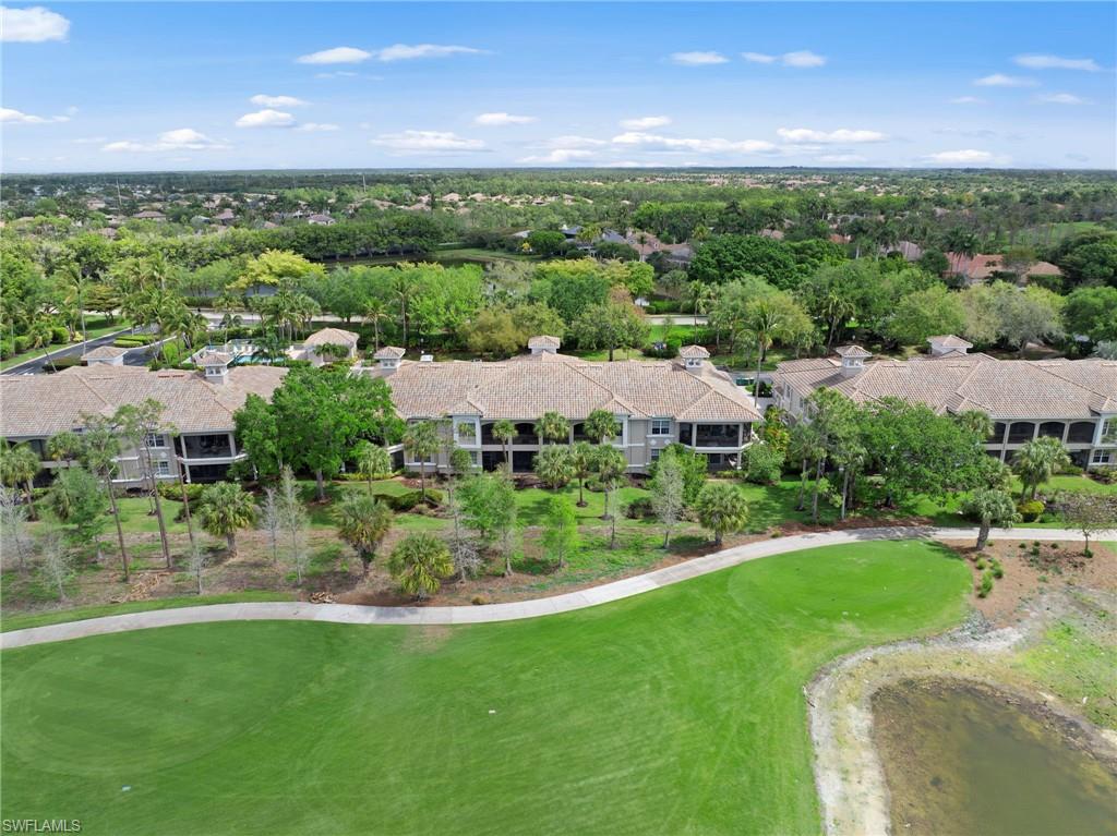 Aerial view of residential area with a golf club
