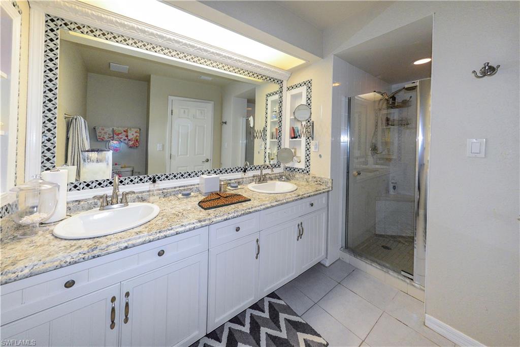 Dual vanity with undermount sinks and brushed nickel fixtures