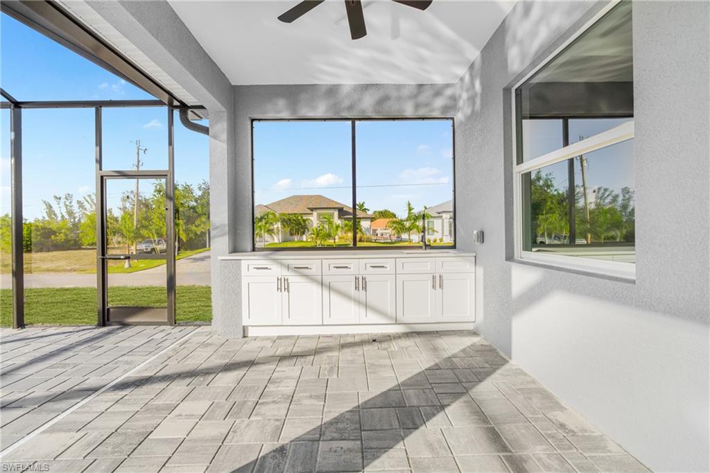 Unfurnished sunroom featuring a residential view
