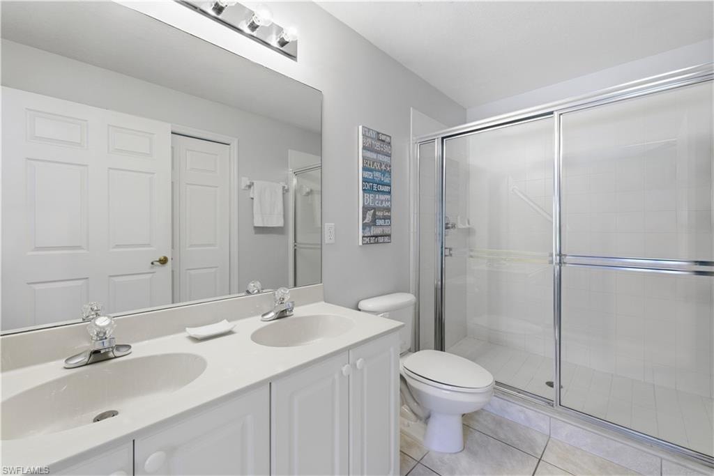 Double sink updated bathroom and shower