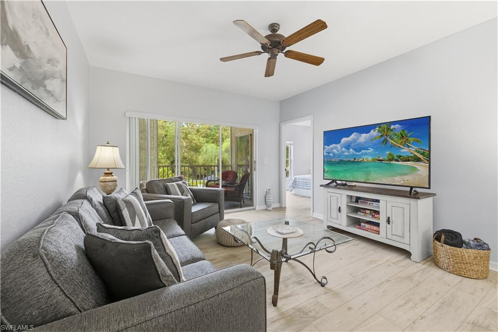 Large flat screen television and view of the preserve area