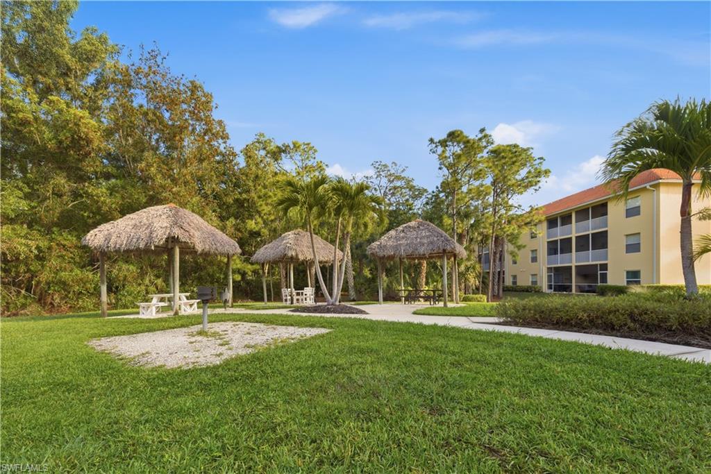 Party fun in the tiki huts and grilling areas with tables