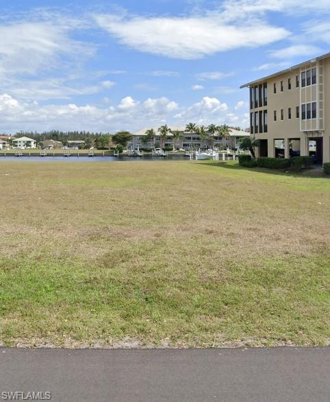 Cleared, buildable lot with concrete seawall