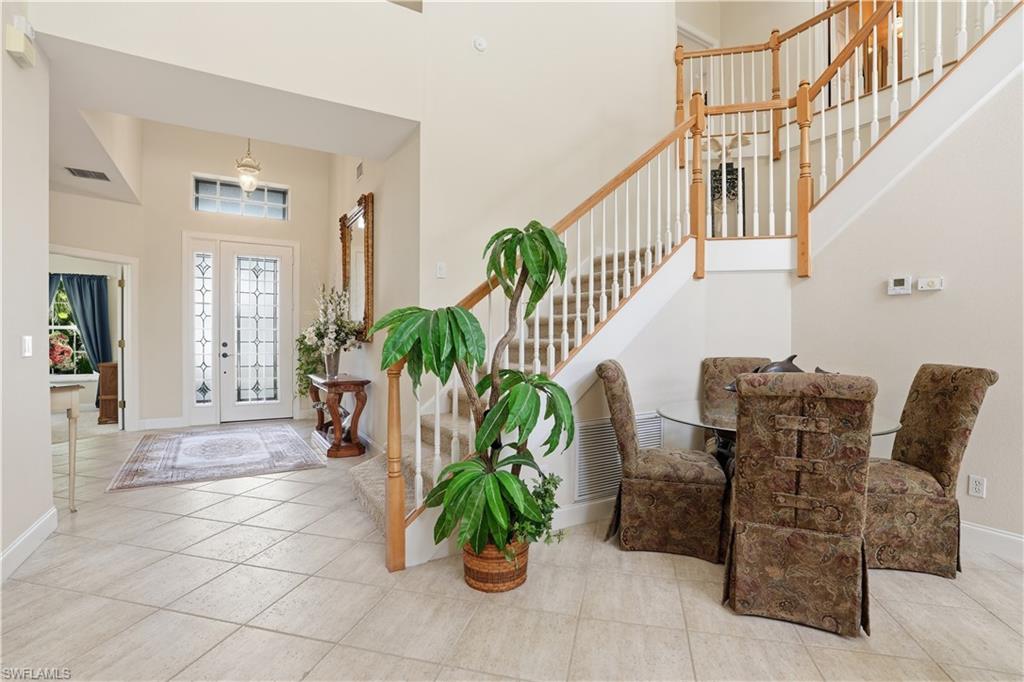 View of foyer and grand staircase.