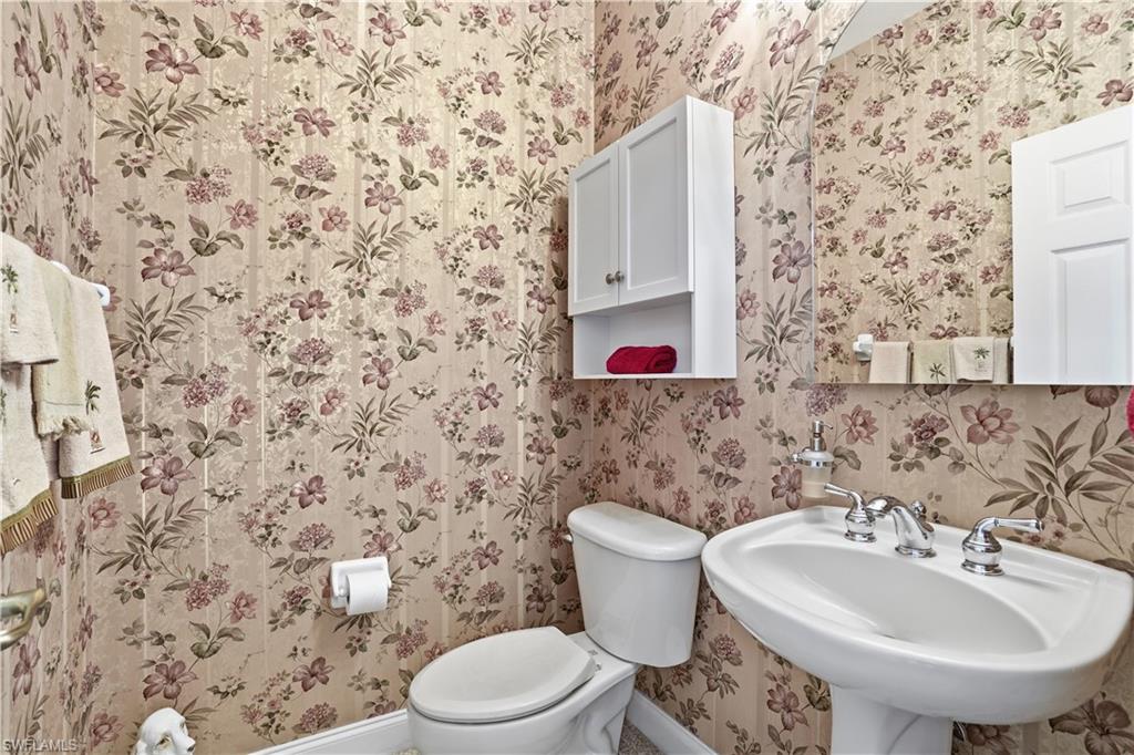 Powder room, off the foyer.
