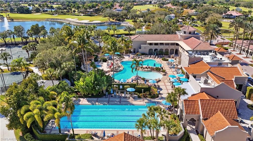 A 2,800 sq. ft. heated lagoon-style swimming pool with walk-in entry, waterfall, whirlpool spa and a 75 ft. Olympic lap pool for avid swimmers