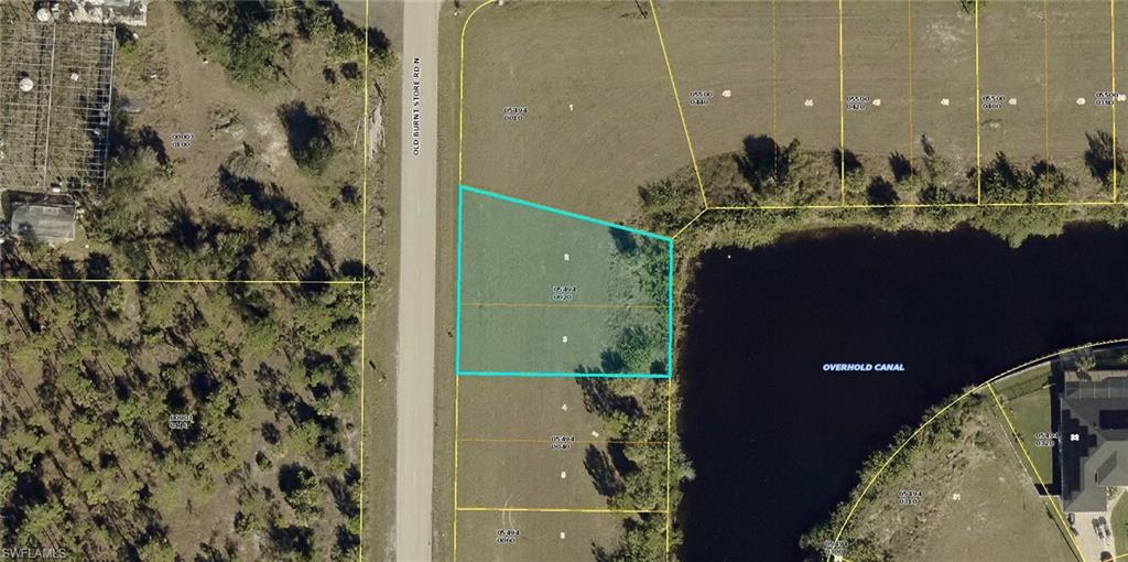 Aerial map of property and surrounding area featuring property boundaries highlighted