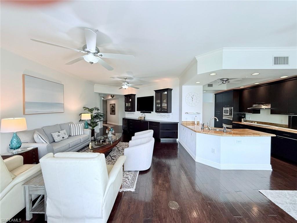 Built-in bar & open granite kitchen