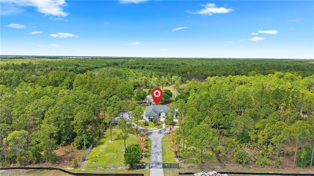 Drone / aerial view of a heavily wooded area
