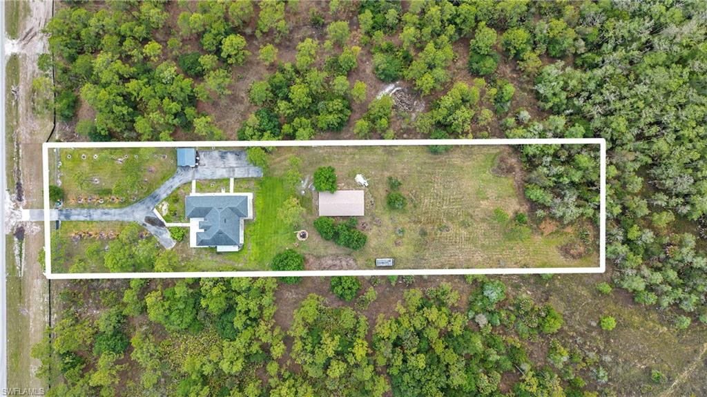 Aerial view of property's location with property parcel outlined