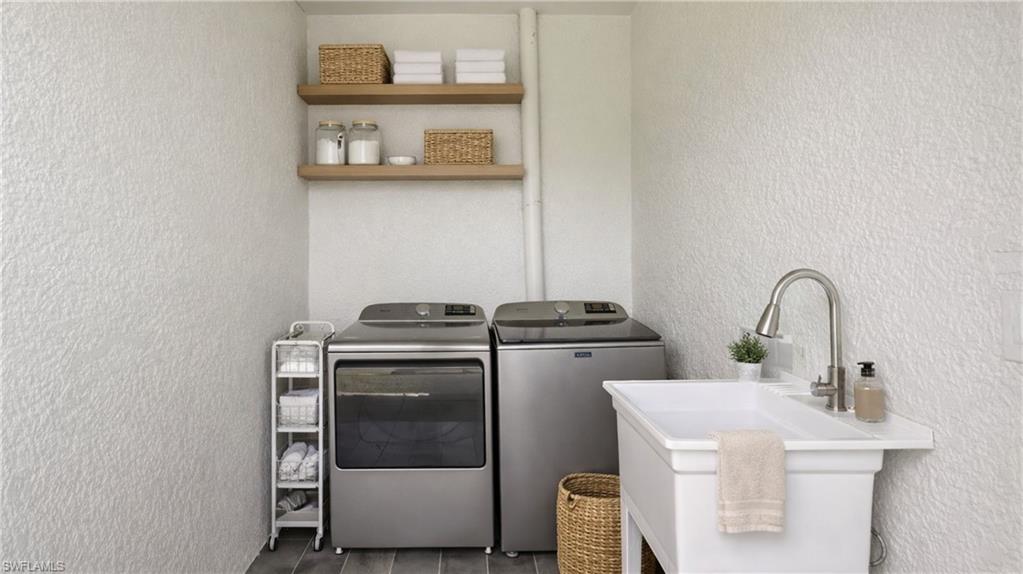 Laundry room with washer and dryer