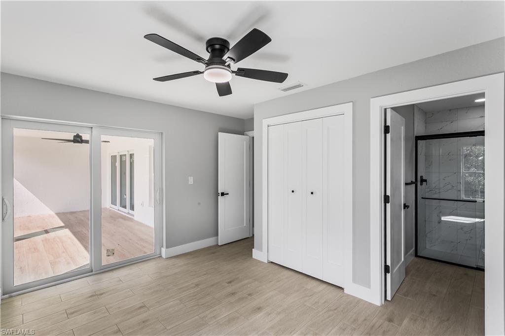 A split floor plan provides privacy, including a second suite with patio access, additional guest bedrooms, and a versatile flex room ideal for office, den, or studio.