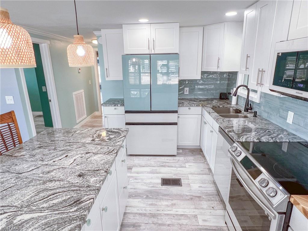 Open concept living, dining and kitchen