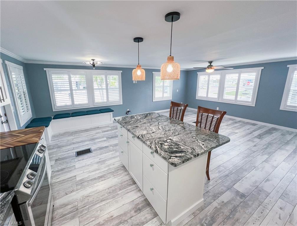 Open concept living, dining and kitchen