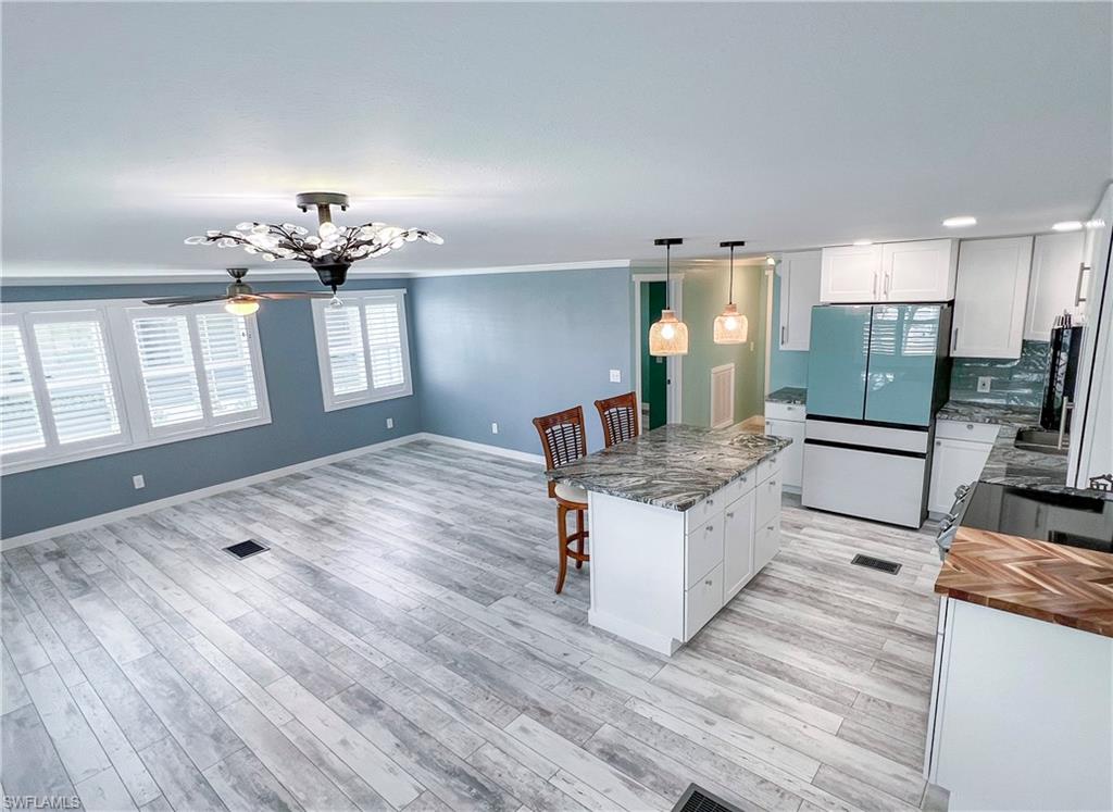 Open concept living, dining and kitchen