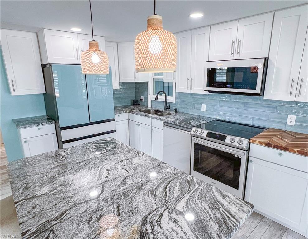 Open concept living, dining and kitchen