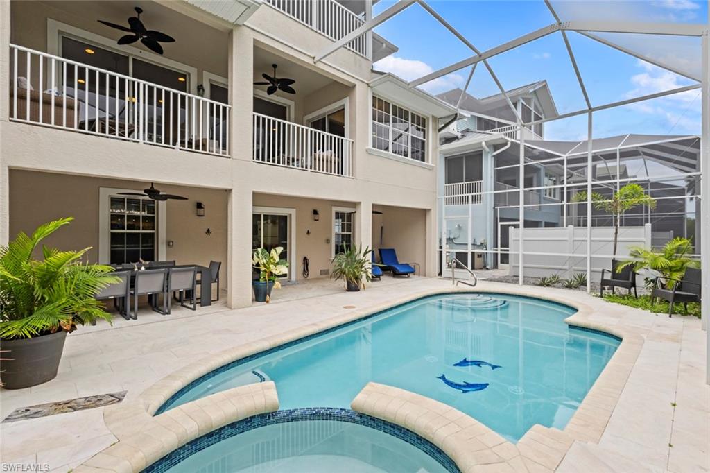 Heated pool and spa. High end marble pool deck too