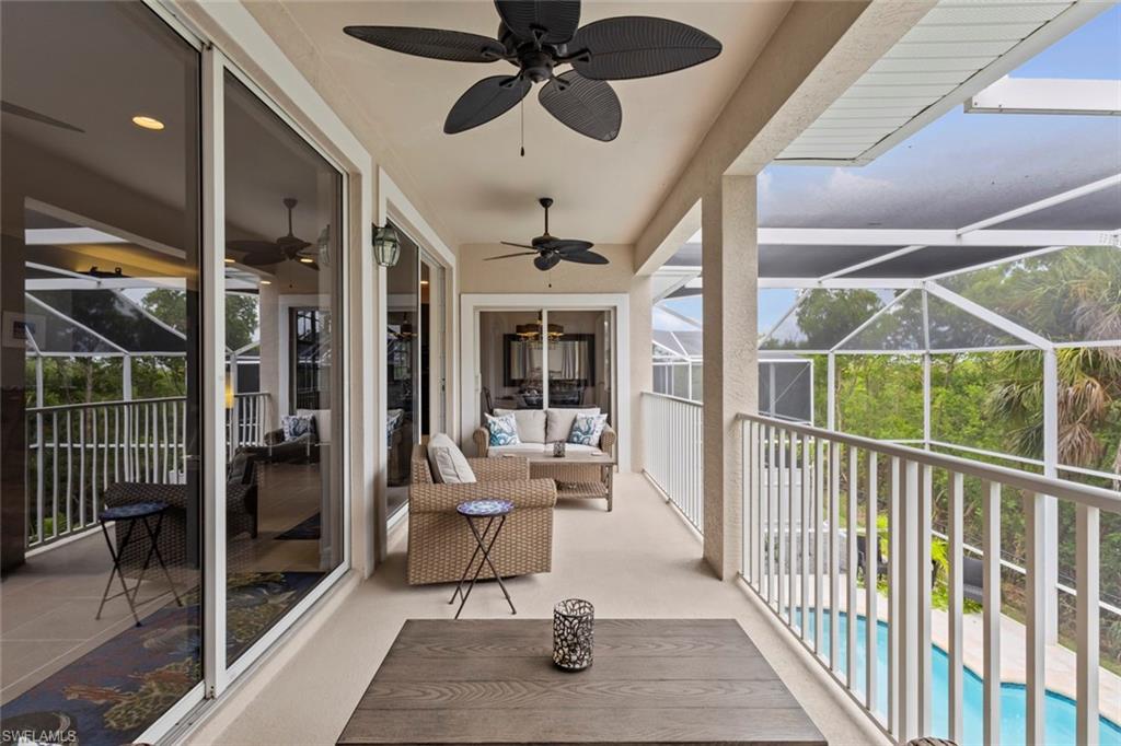 Screened balcony off the main living area overlooking the pool