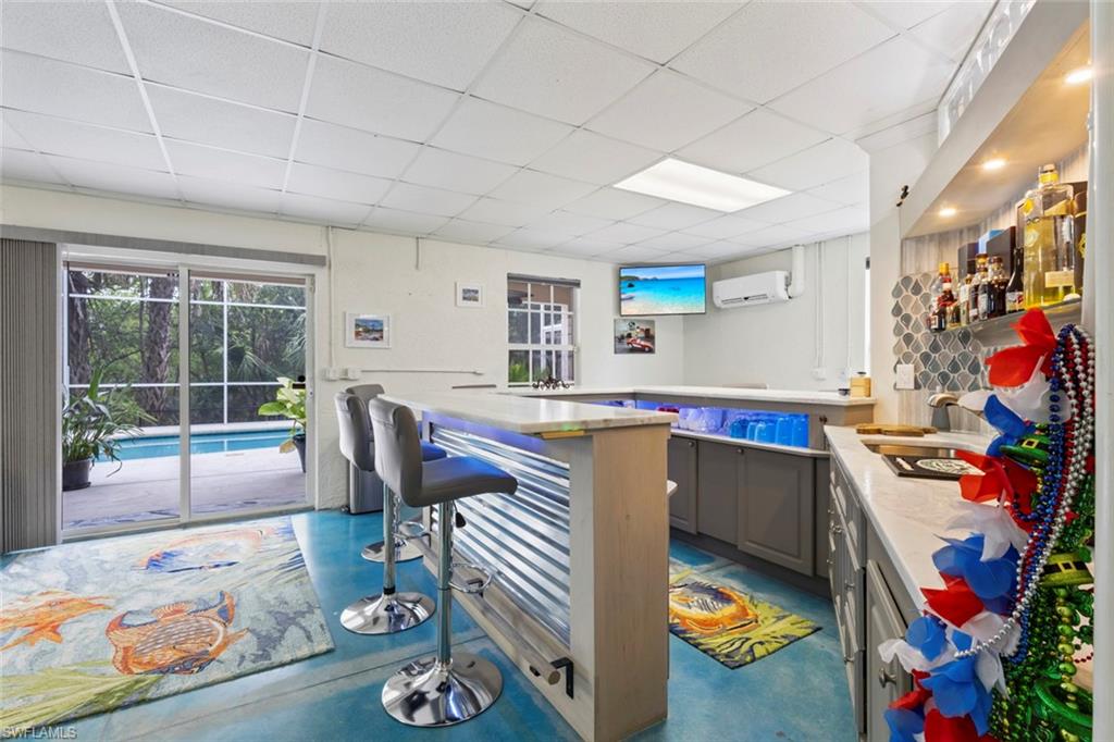 1st floor bonus space with a bar, just off the pool.  Perfect for entertaining